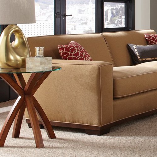 A beige sofa in a living room